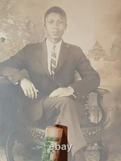 African American Photo BLACK WALLSTREET MAN SITTING IN CHAIR TULSA OKLAHOMA