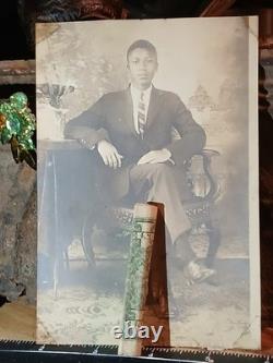 African American Photo BLACK WALLSTREET MAN SITTING IN CHAIR TULSA OKLAHOMA