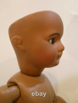 Antique 13 1/2 black French bisque socket head doll, fully jointed body