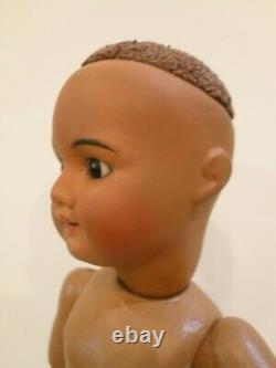 Antique 13 1/2 black French bisque socket head doll, fully jointed body