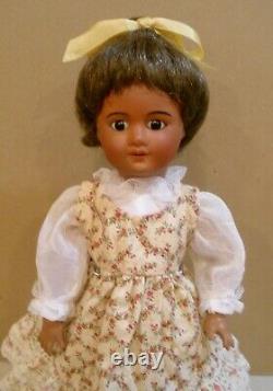 Antique 13 1/2 black French bisque socket head doll, fully jointed body
