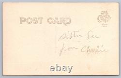 Antique RPPC portrait black man on sidewalk African American Real Photo Postcard