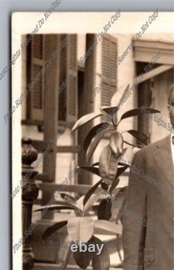 Antique RPPC portrait black man on sidewalk African American Real Photo Postcard