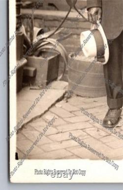 Antique RPPC portrait black man on sidewalk African American Real Photo Postcard