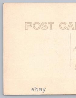 Antique RPPC portrait black man on sidewalk African American Real Photo Postcard