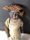 Antique african american doll PAPER MACHE AND CLOTH BODY WITH GLASS EYES