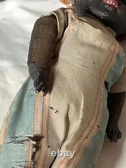 Antique african american doll PAPER MACHE AND CLOTH BODY WITH GLASS EYES