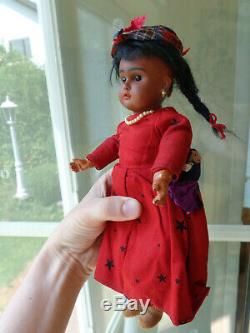 Antique doll black doll brown bisque with pearl earrings very cute girl