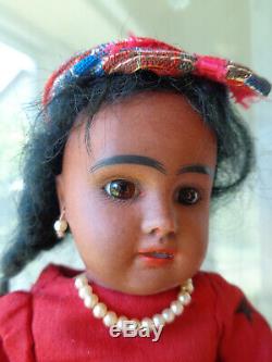 Antique doll black doll brown bisque with pearl earrings very cute girl