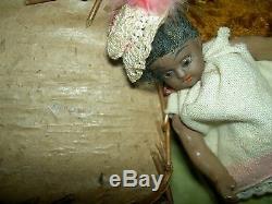 Antique dollhouse-size black bisque S & H sockethead mignonette doll withwardrobe