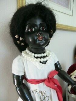 Antique ebony black doll 21 inch, mystery amazing