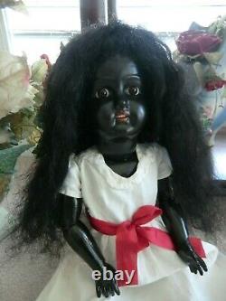 Antique ebony black doll 21 inch, mystery amazing