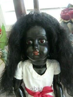 Antique ebony black doll 21 inch, mystery amazing