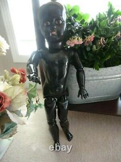 Antique ebony black doll 21 inch, mystery amazing