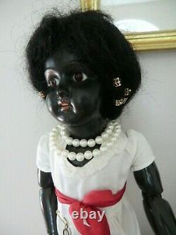 Antique ebony black doll 21 inch, mystery amazing