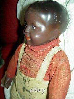 HORSMAN, COTTON JOE black character doll, circa 1910, all original withautographs