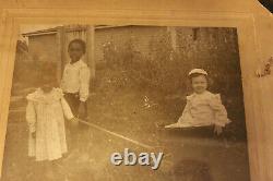 Original Photo, 2 African American childrens Pulling a Caucasian child in wagon
