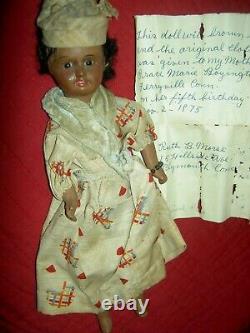 Pretty antique, BROWN bisque, signed UNIS 60 FRANCE, jointed doll withglass eyes