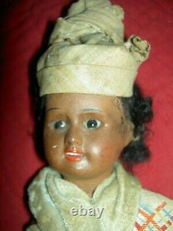 Pretty antique, BROWN bisque, signed UNIS 60 FRANCE, jointed doll withglass eyes