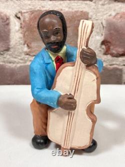 Seven Vintage Painted Porcelain Figurines of Black African American Musicians