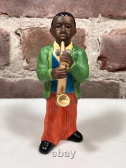 Seven Vintage Painted Porcelain Figurines of Black African American Musicians