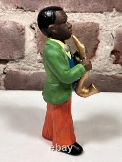 Seven Vintage Painted Porcelain Figurines of Black African American Musicians