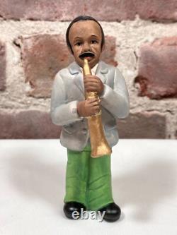 Seven Vintage Painted Porcelain Figurines of Black African American Musicians