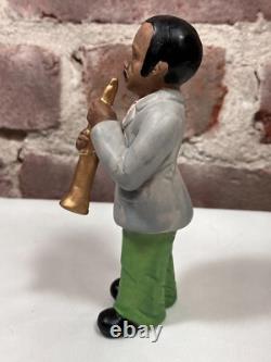 Seven Vintage Painted Porcelain Figurines of Black African American Musicians