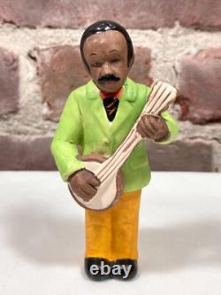 Seven Vintage Painted Porcelain Figurines of Black African American Musicians