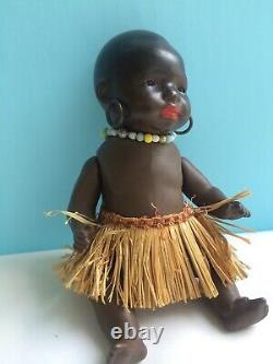 South Seas Baby Antique German, Brown Bisque Jointed Doll with Glass Eyes Orig