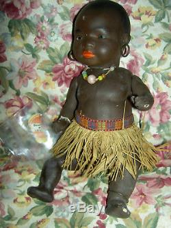 South Seas Baby (labeled) antique German, brown bisque j'td doll with glass eyes