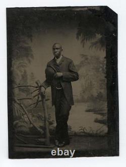 Tintype African American Man Holding Bowler Hat Painted Background