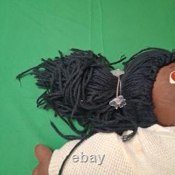 Unmarked Unsigned African American Doll withDress
