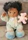 Vintage My Child African American Doll, withoriginal pink teddy bear attached